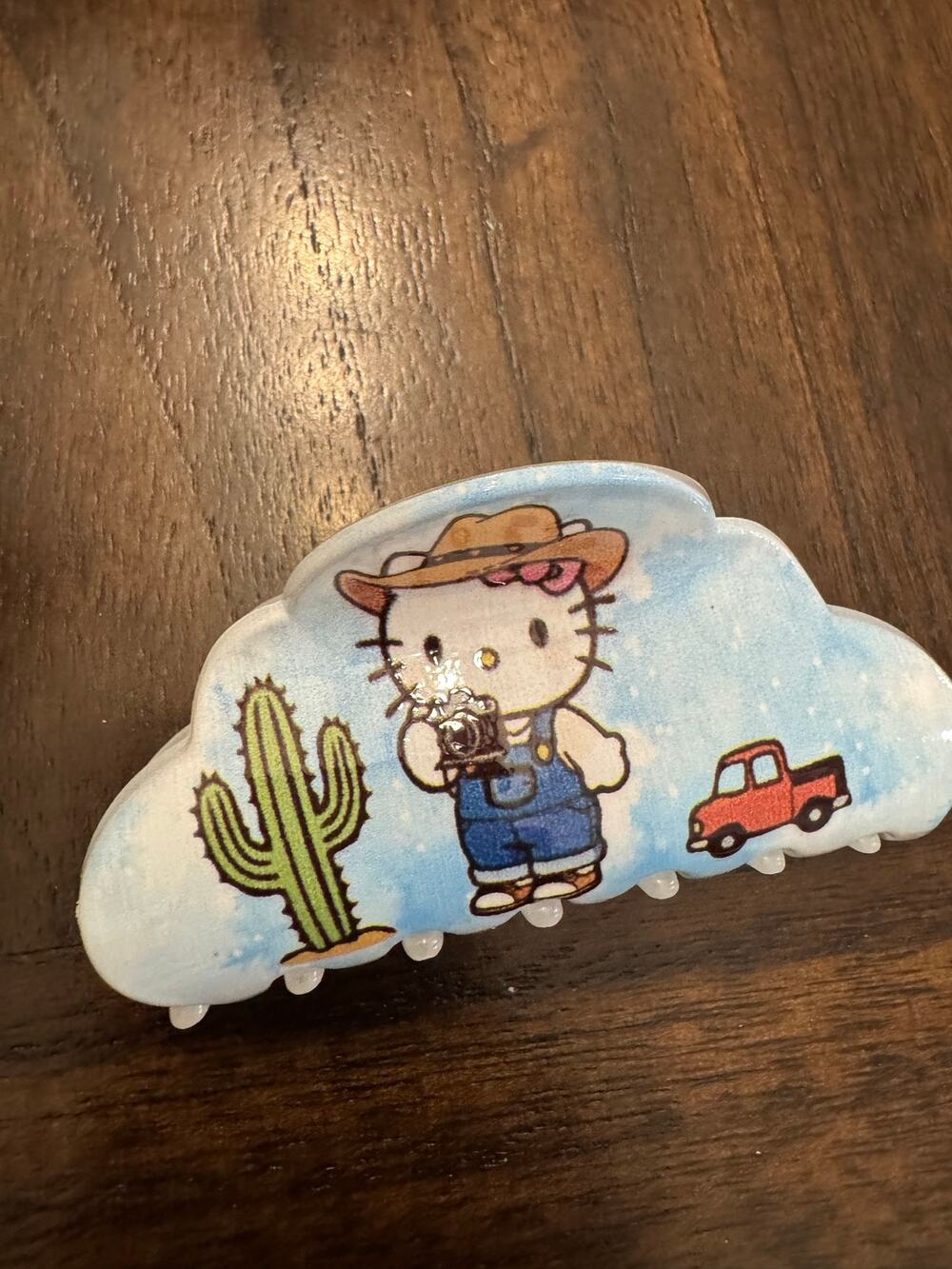 Hello Kitty cowboy hair clip claw with cactus and truck design